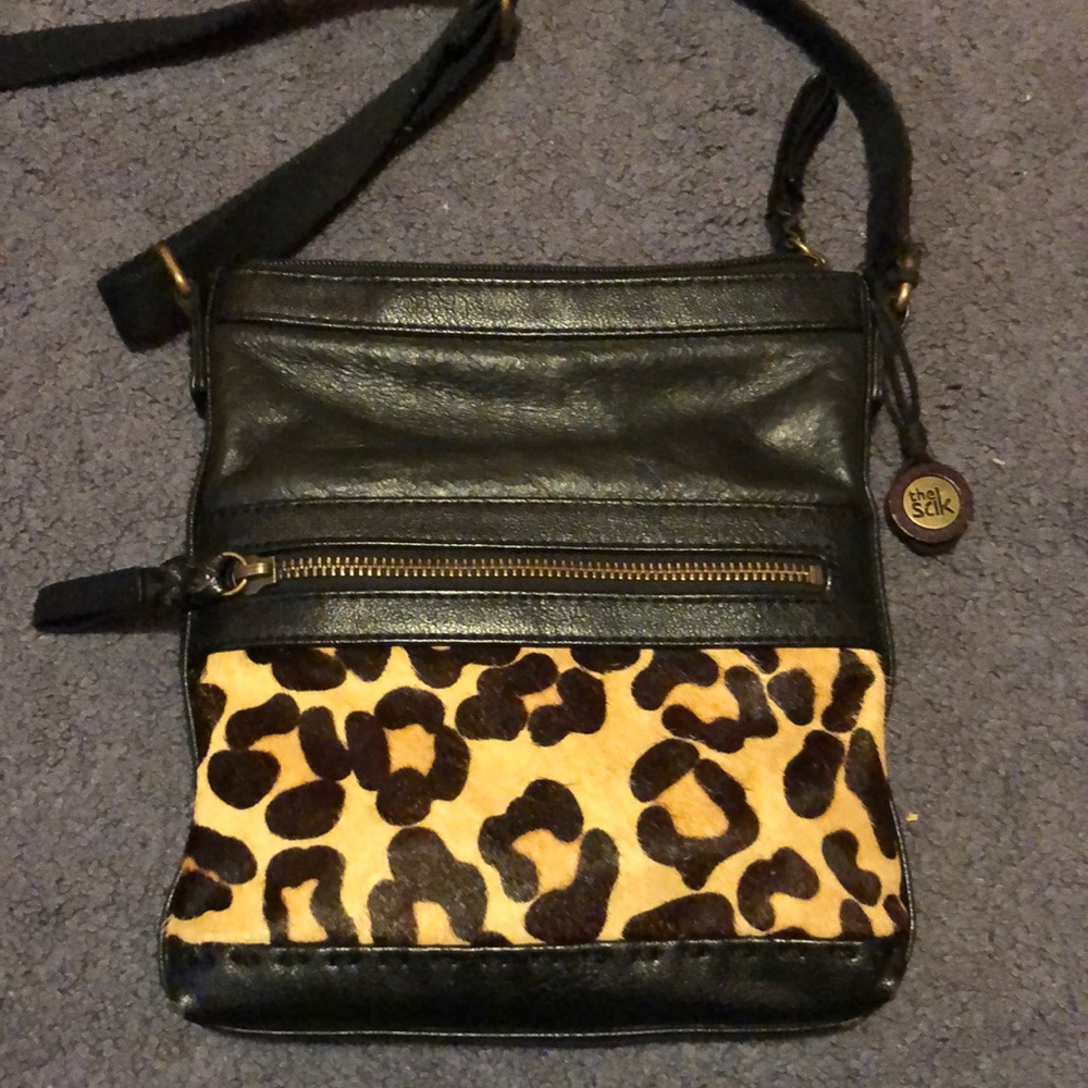 A cheetah print touch purse and matching ristlet